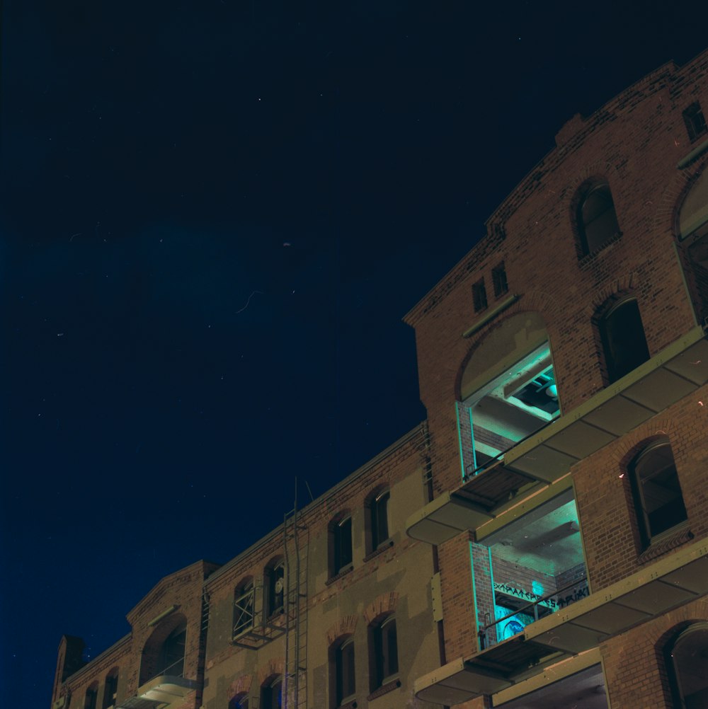 brown concrete building during nighttime