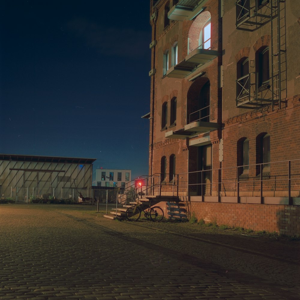 brown concrete building during night time