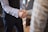 Close-up of hands shaking in agreement over a business contract.