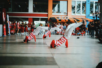 people playing ice hockey on court