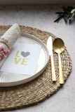 brown wooden spoon on white ceramic plate