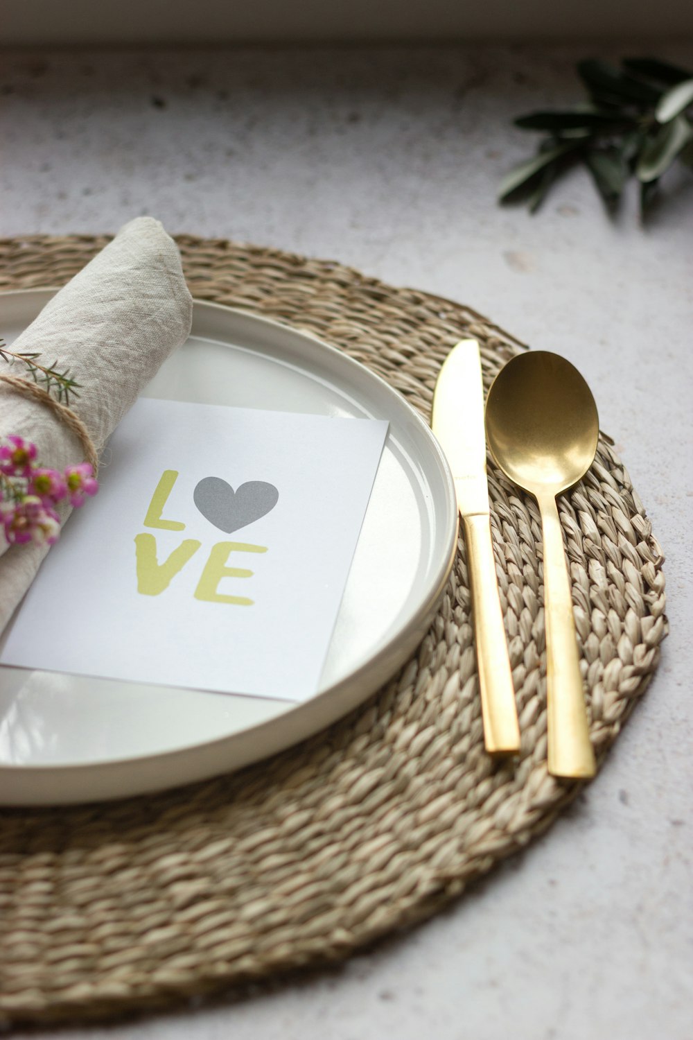 brown wooden spoon on white ceramic plate