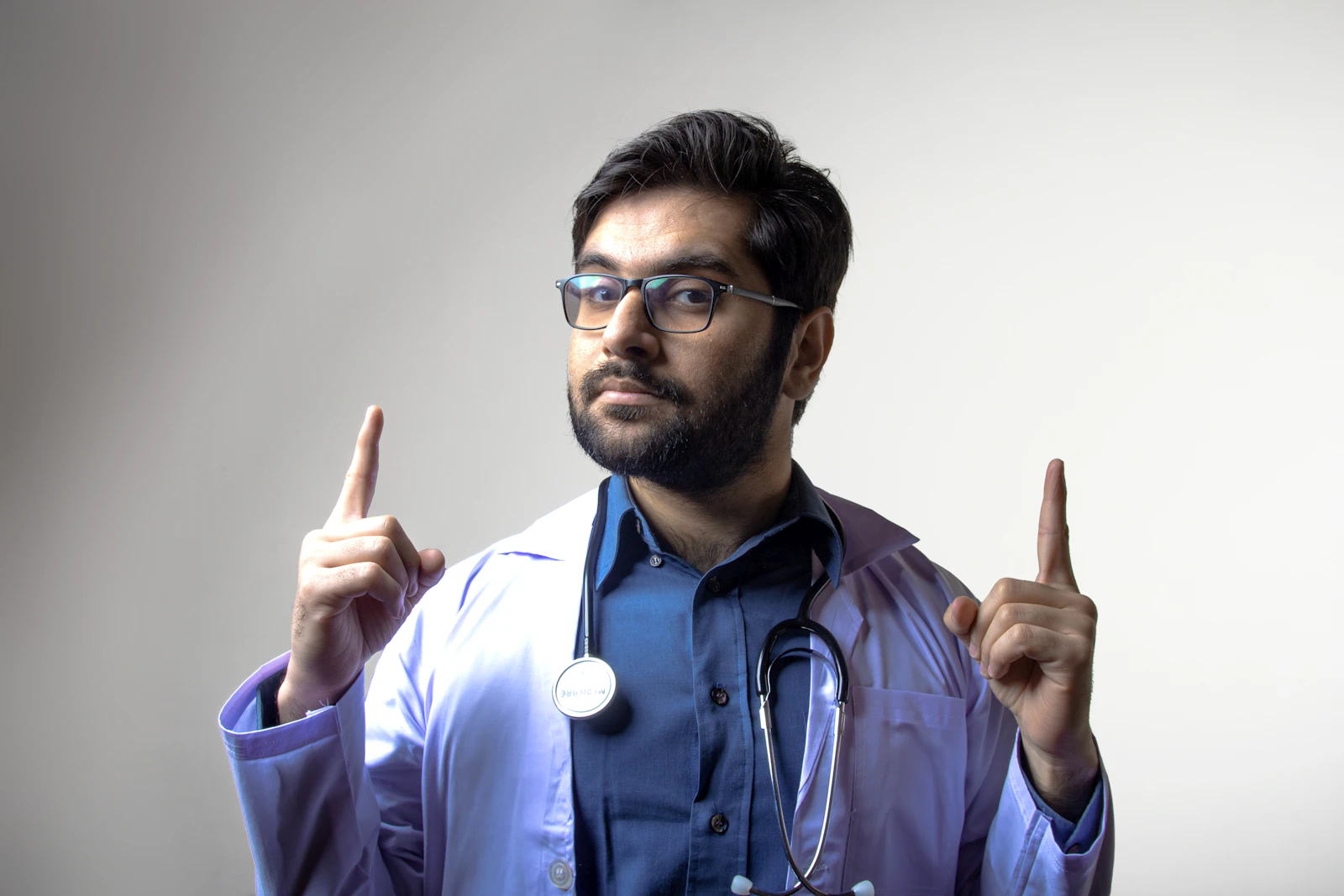 Arun Nair, home physiotherapist, in scrubs