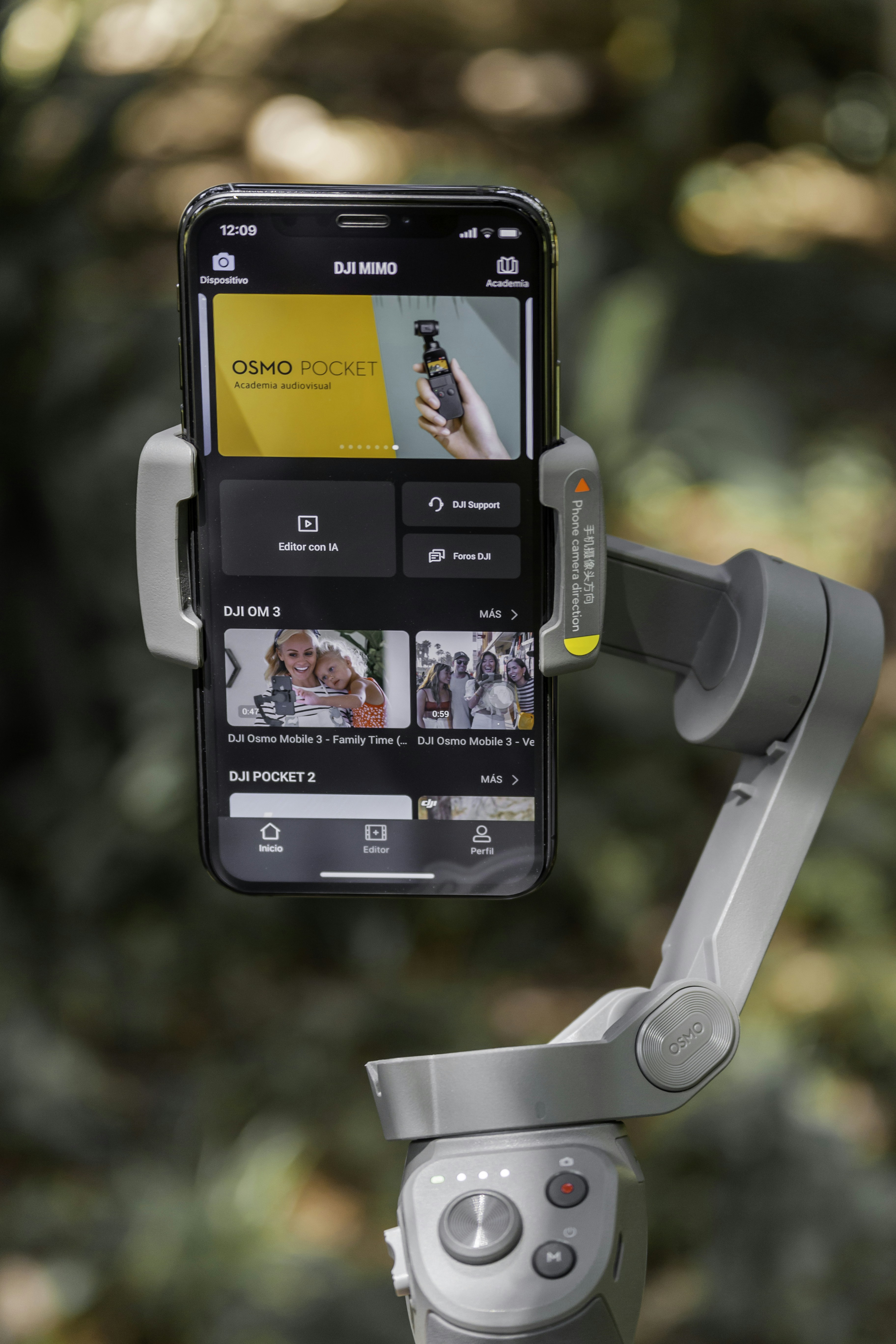 black samsung android smartphone on white and gray corded headphones