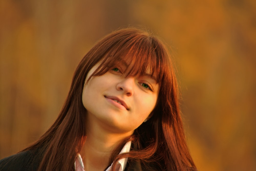 woman in white collared shirt