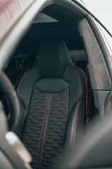 black car steering wheel in car
