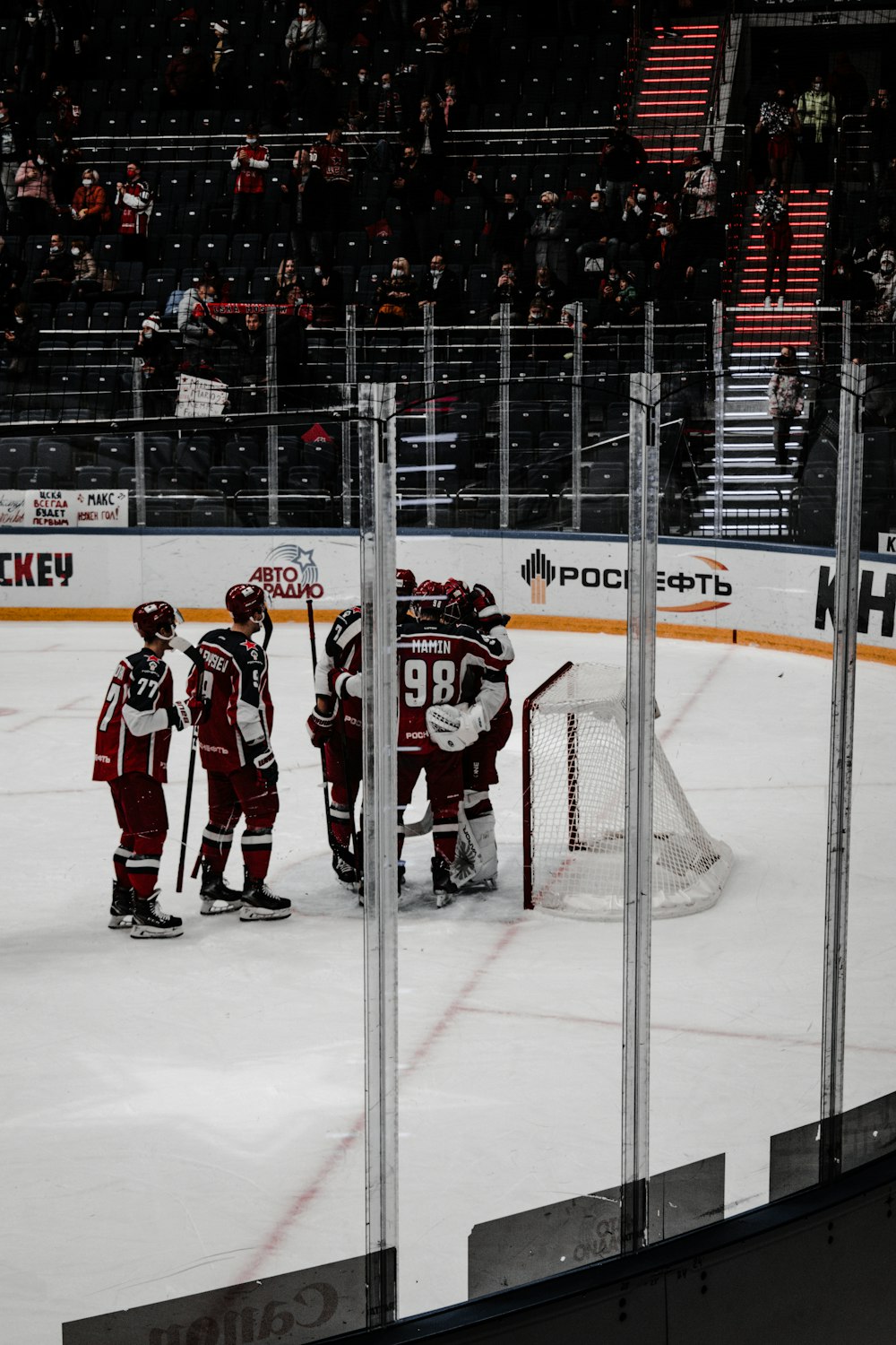 ice hockey players on ice hockey field