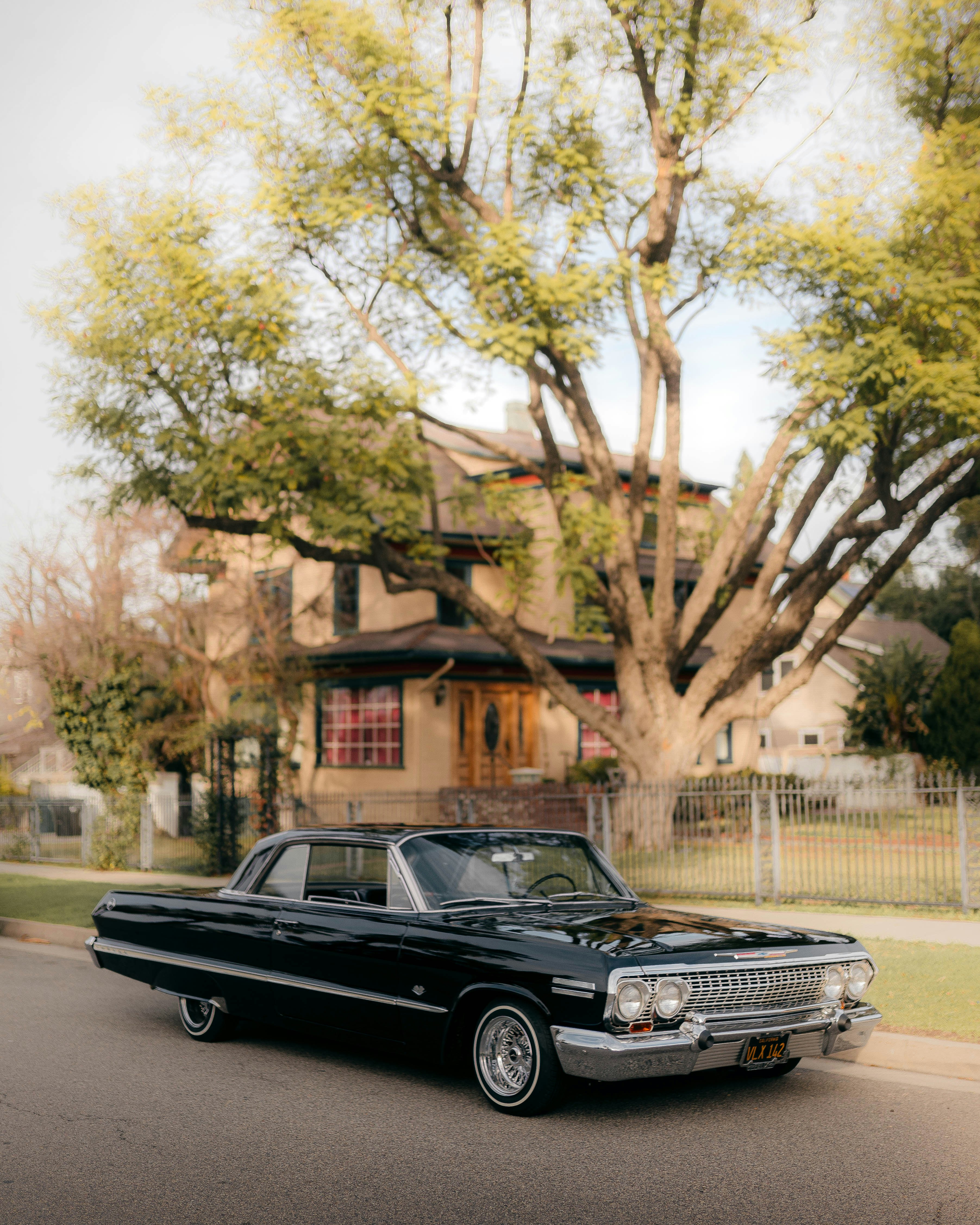 black coupe on road during daytime