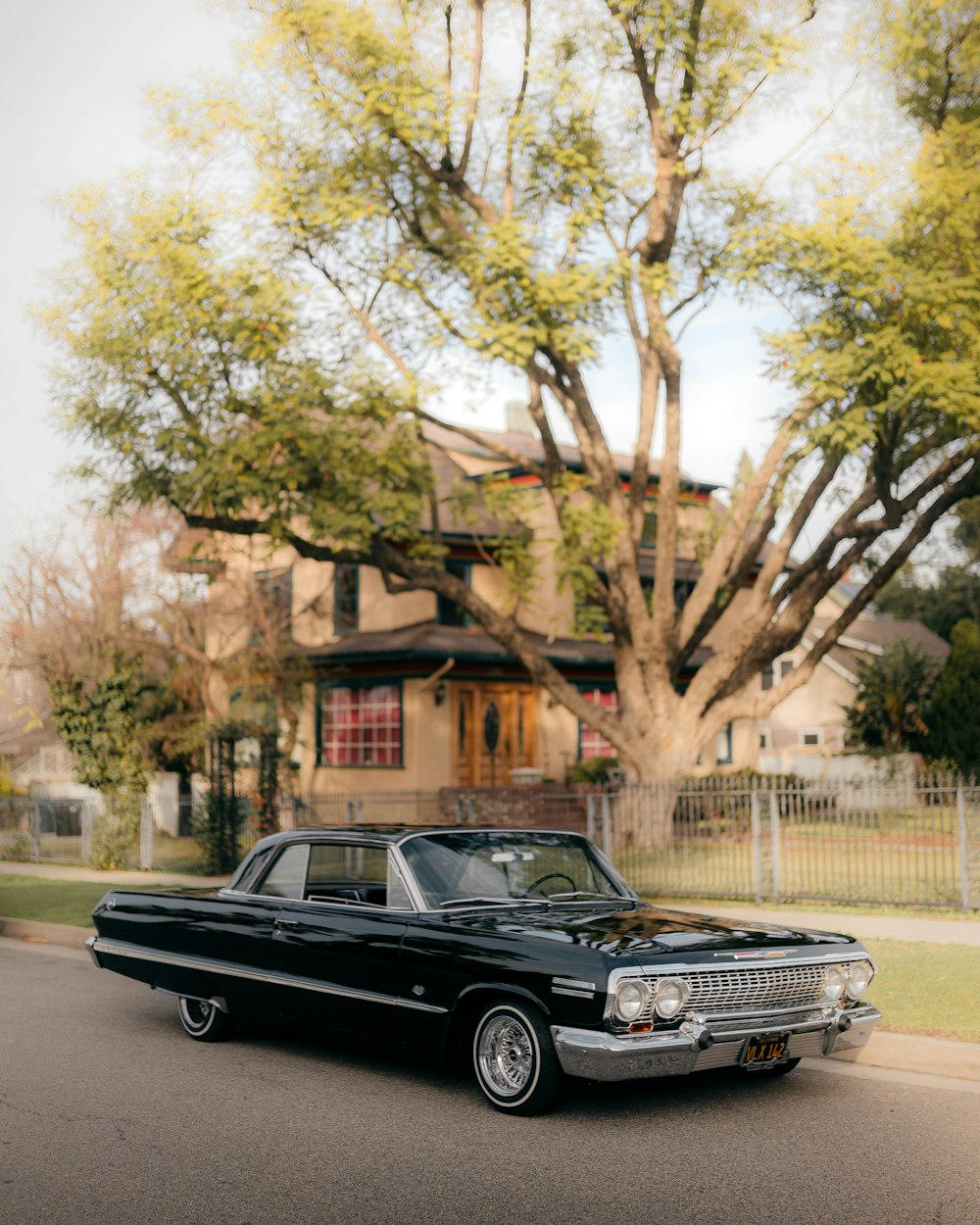 black coupe on road during daytime