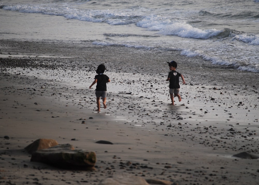 people walking on beach during daytime