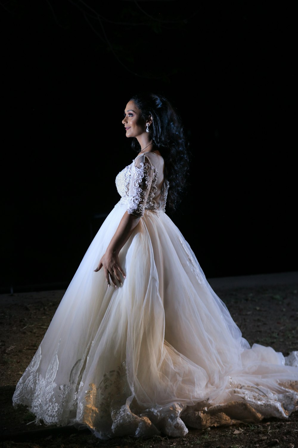 woman in white floral wedding dress