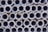 A large stack of metal pipes arranged in neatly aligned rows and columns.