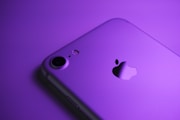 silver iphone 6 on white surface