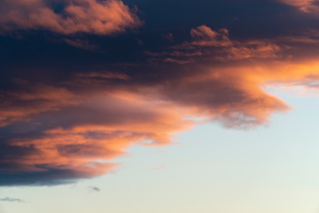 orange and grey clouds during sunset