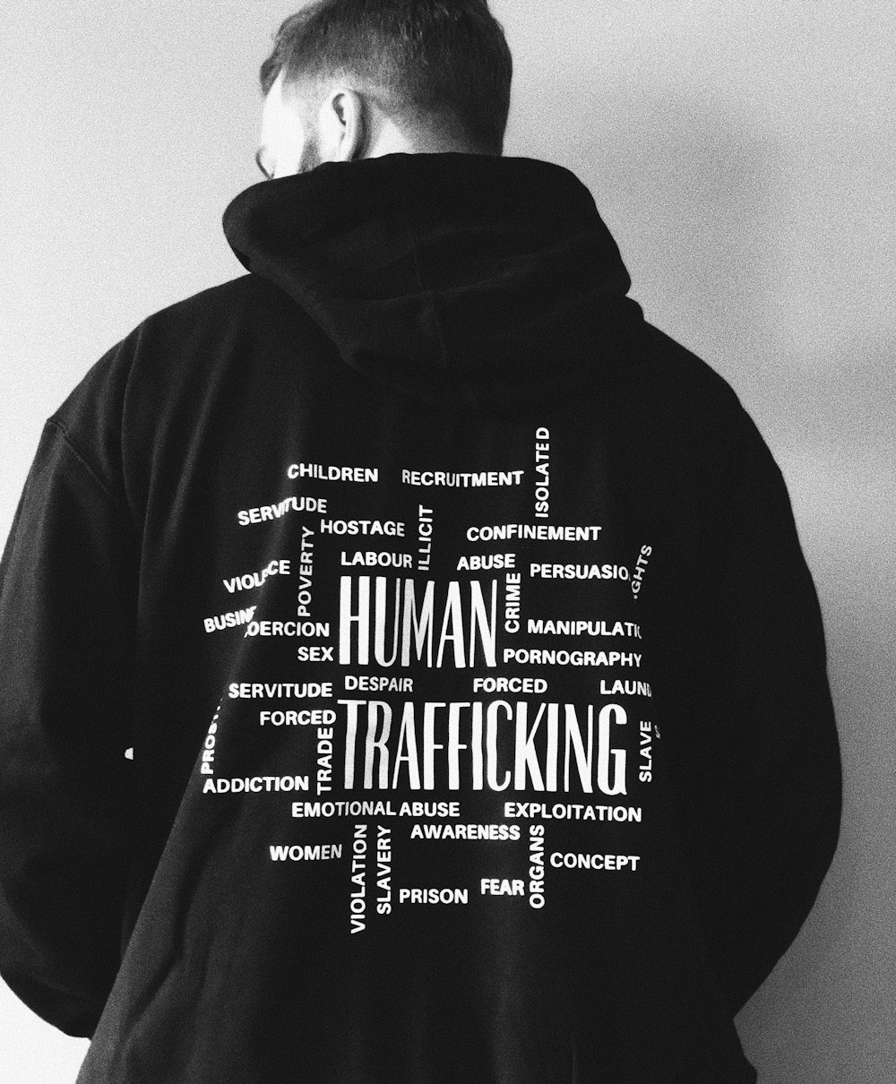 man in black and white pullover hoodie