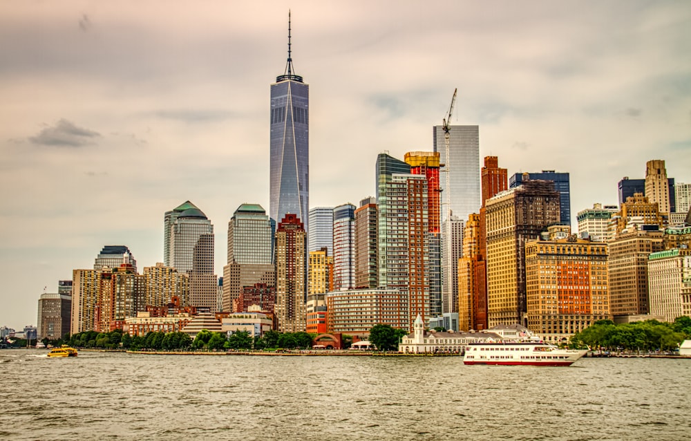 city skyline across body of water during daytime