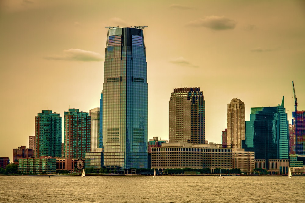 city skyline under gray sky during daytime