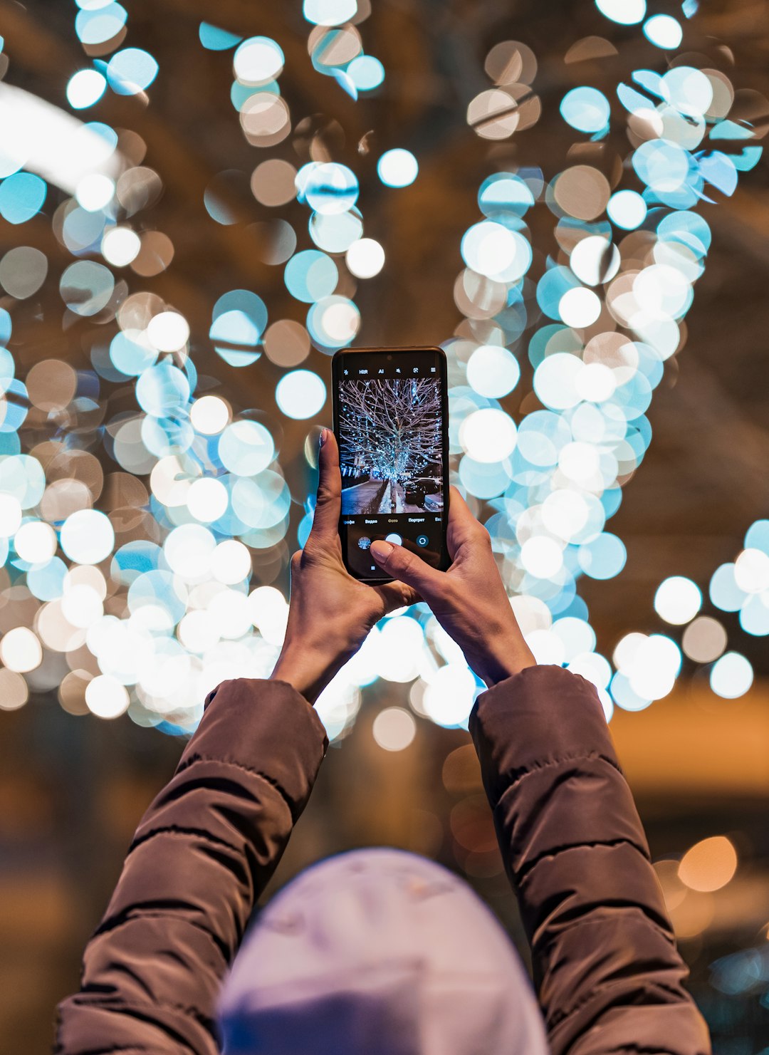 person holding black android smartphone