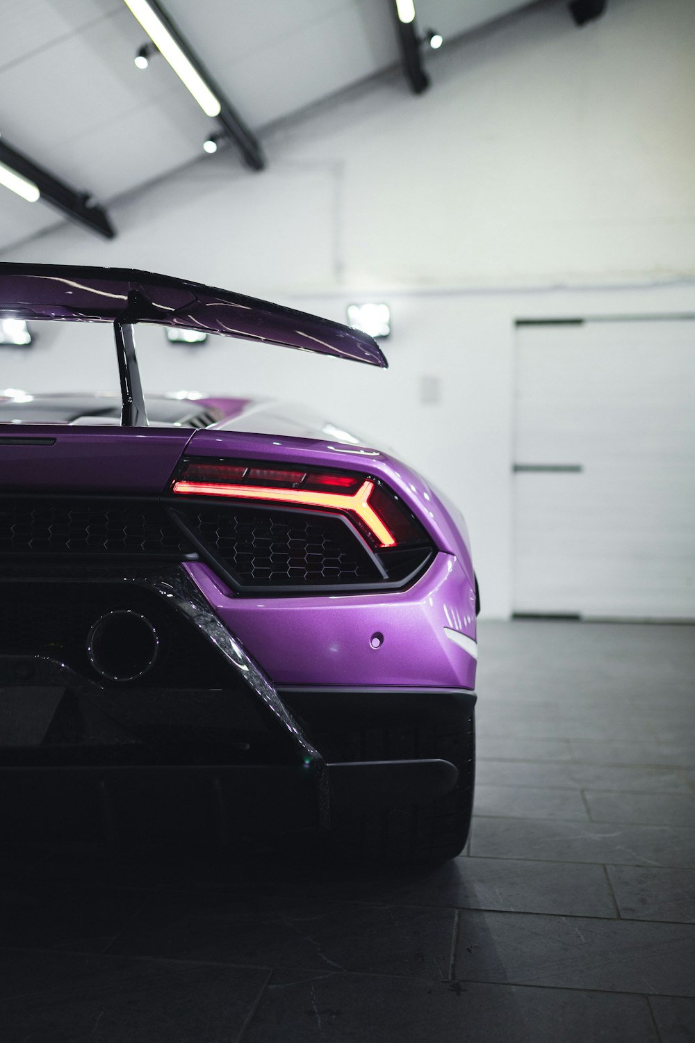 purple and black car in a room