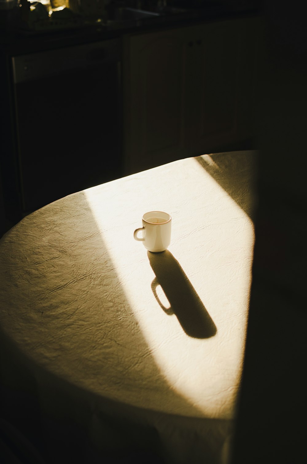 white plastic bottle on white textile