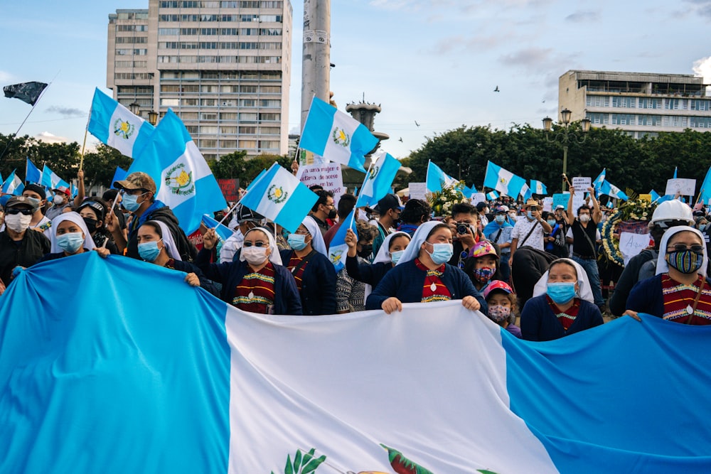 people gathering on street during daytime