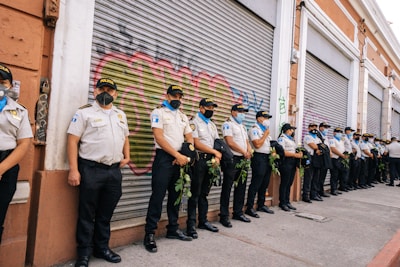 A photo of Spanish police officers in uniform during a public event.