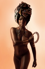 woman in black brassiere and panty with gold crown
