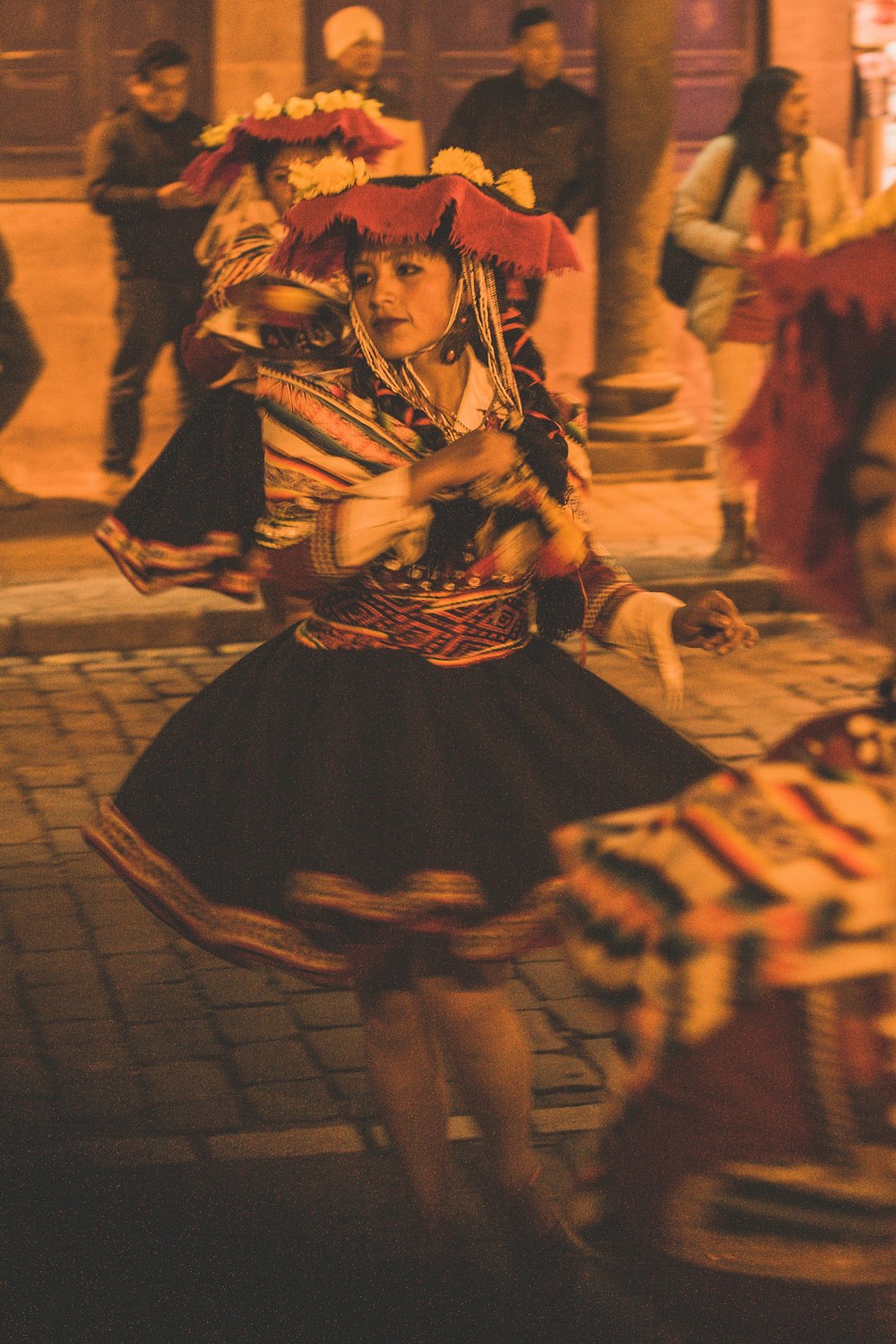 woman in black and white dress dancing