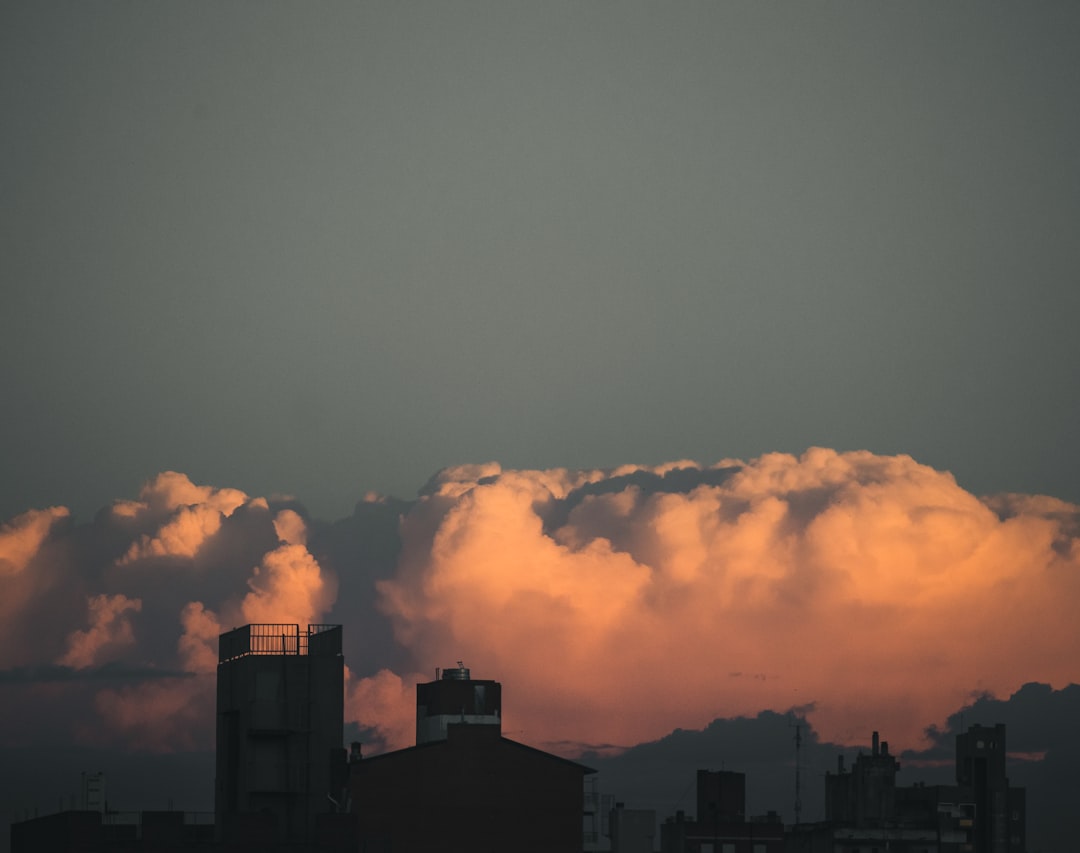 silhouette of building during sunset