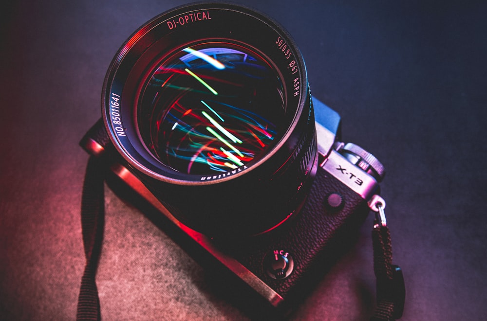 black and silver dslr camera