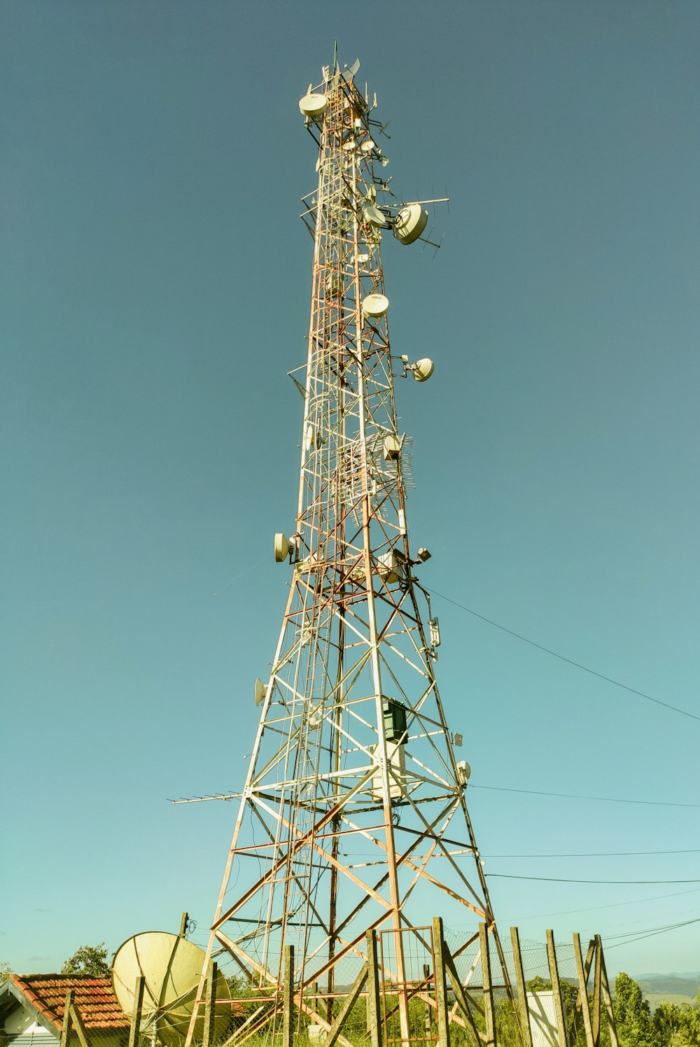 white and black steel tower under blue sky during daytime