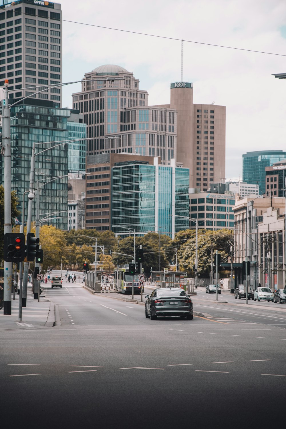 cars on road near buildings during daytime