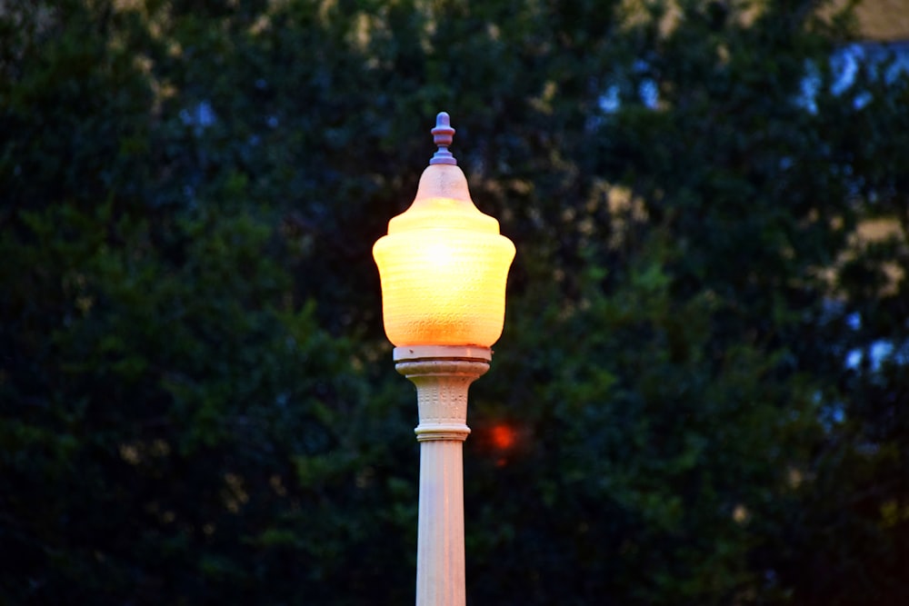 yellow light bulb turned on during nighttime