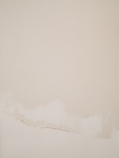 A serene abstract painting with soft, muted colors hanging elegantly on a minimalist wall.