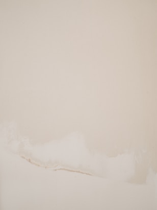 white sand beach during daytime