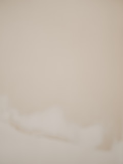 white round light on white ceiling