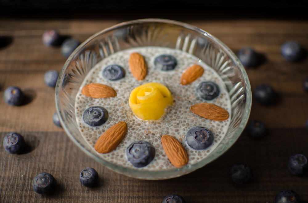 yellow and white round cake on silver round plate