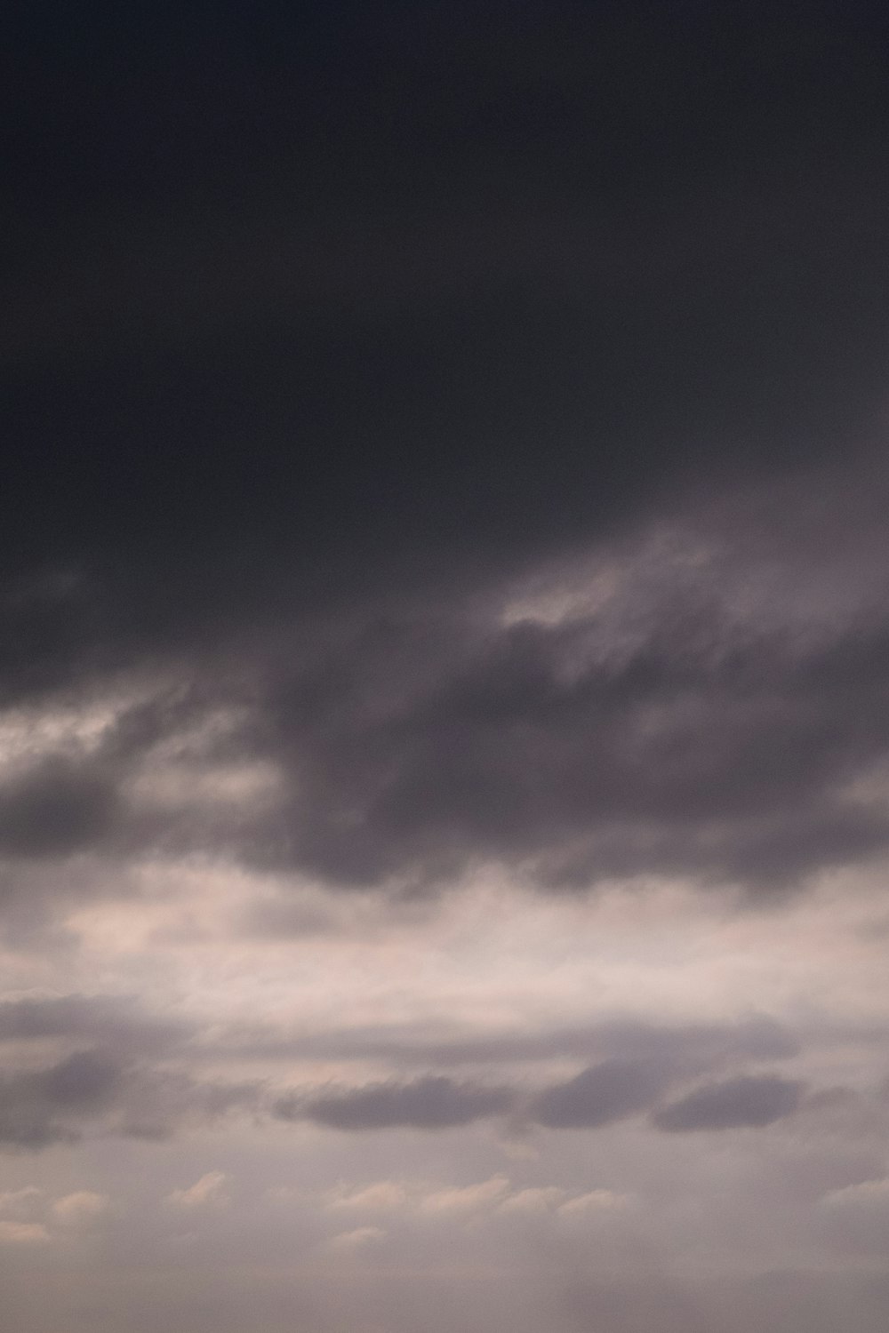 black clouds and blue sky