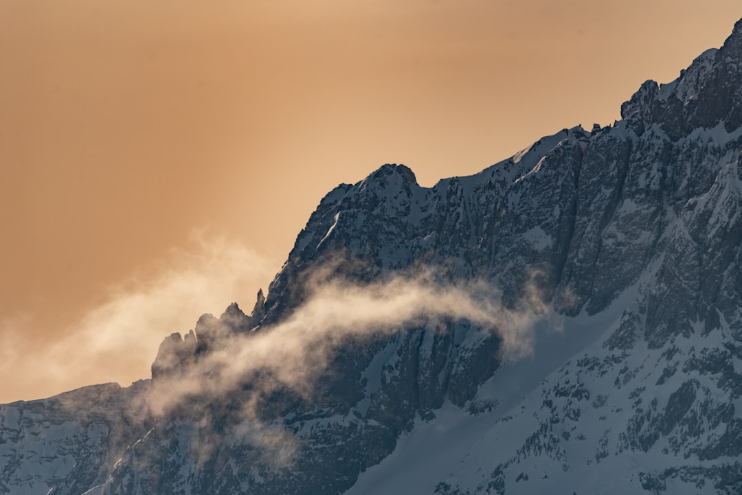 snow covered mountain during daytime