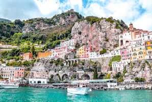 Colorful cliffside buildings overlooking the harbor on Italy's Amalfi Coast