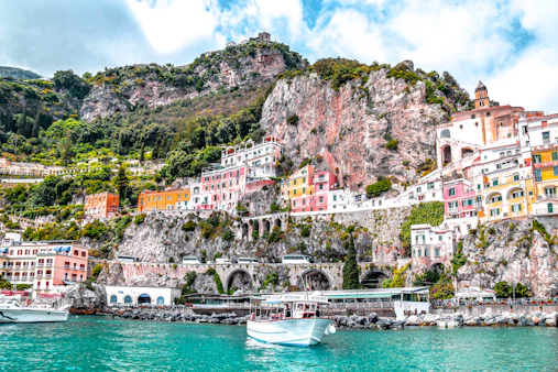 Colorful cliffside buildings overlooking the harbor on Italy's Amalfi Coast