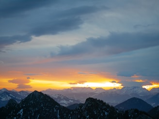 A beautiful sunset over mountains, evoking inspiration.