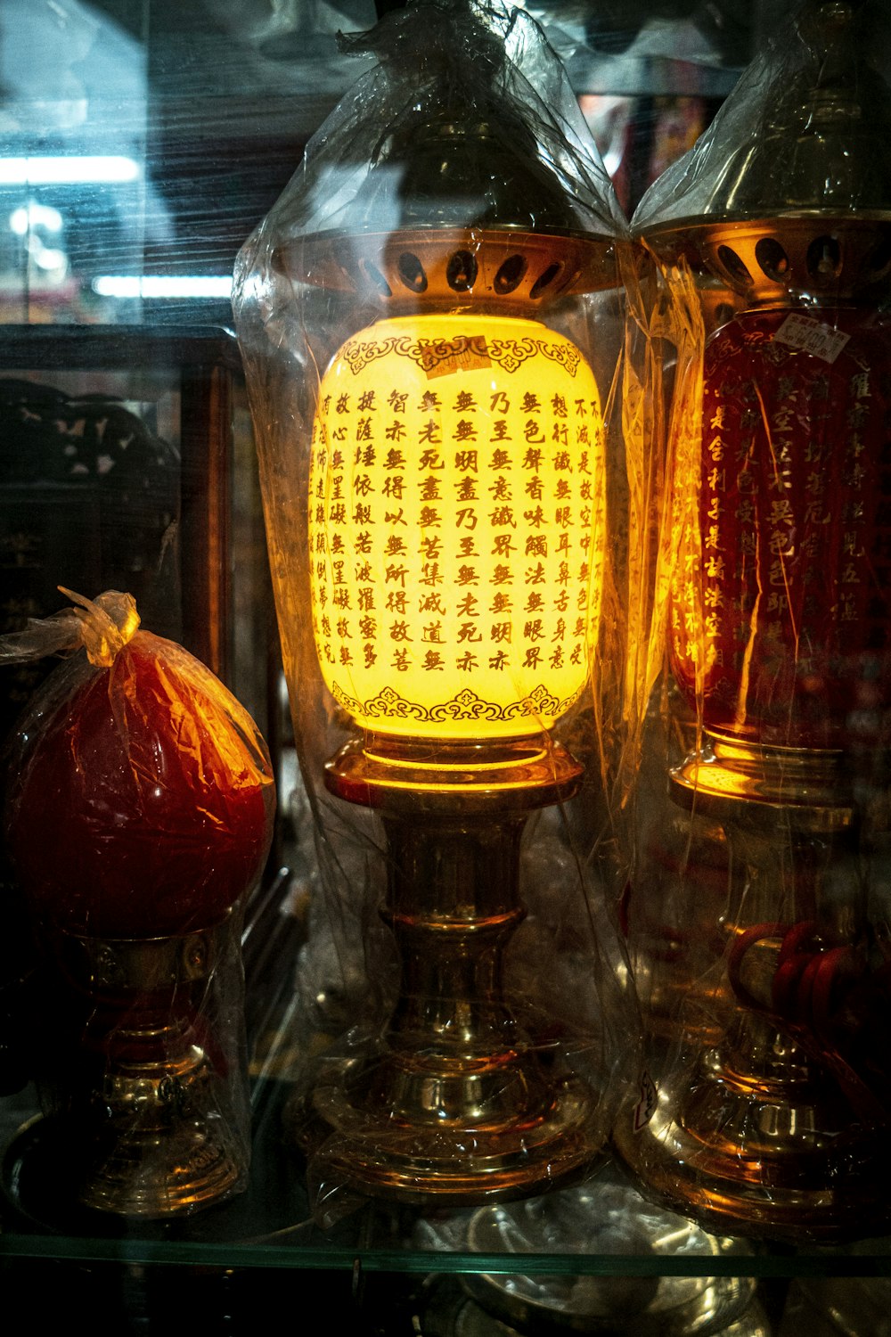 red and yellow glass bottle