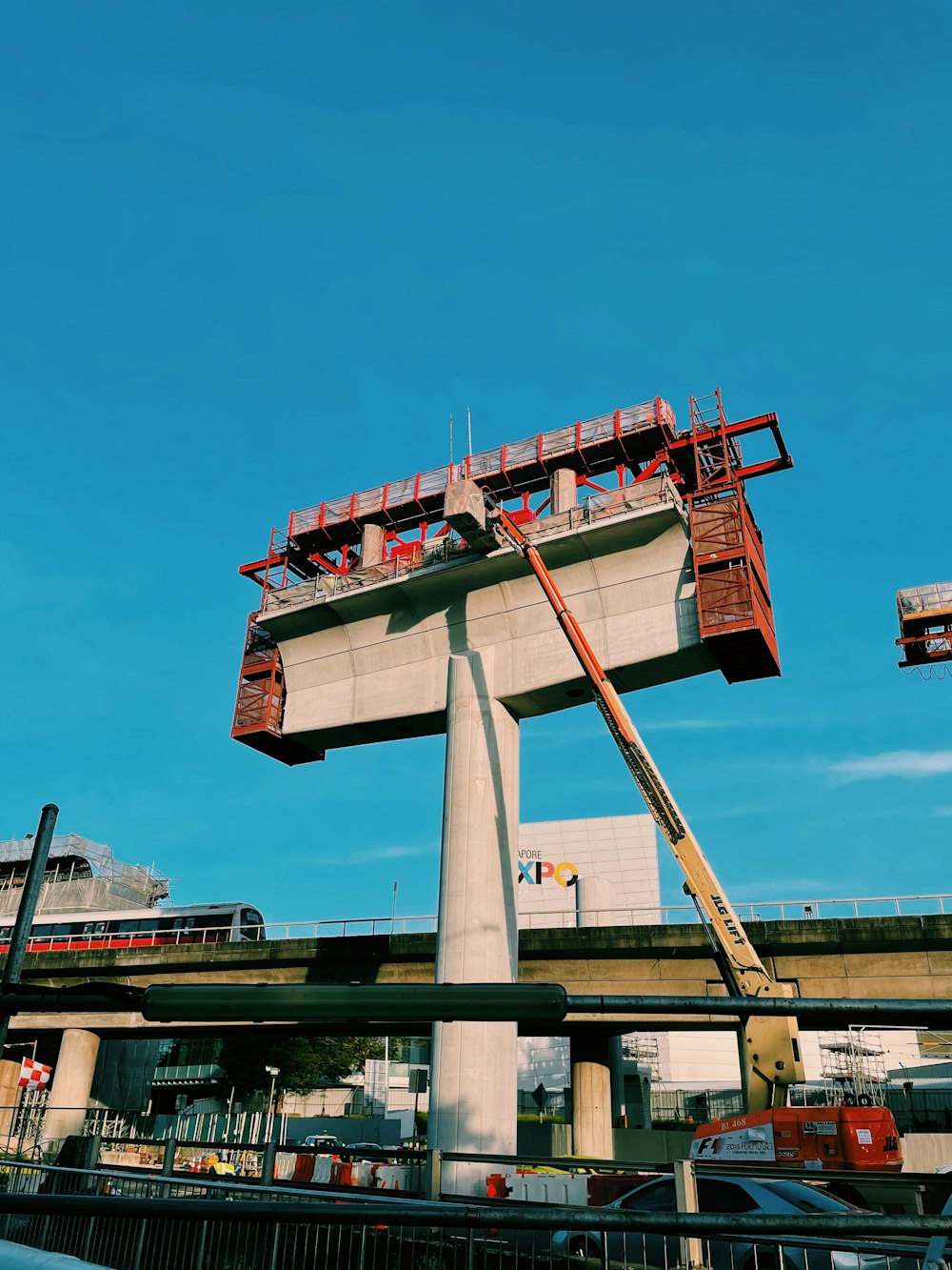 red and white concrete building under blue sky during daytime