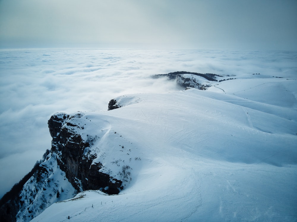 snow covered mountain during daytime