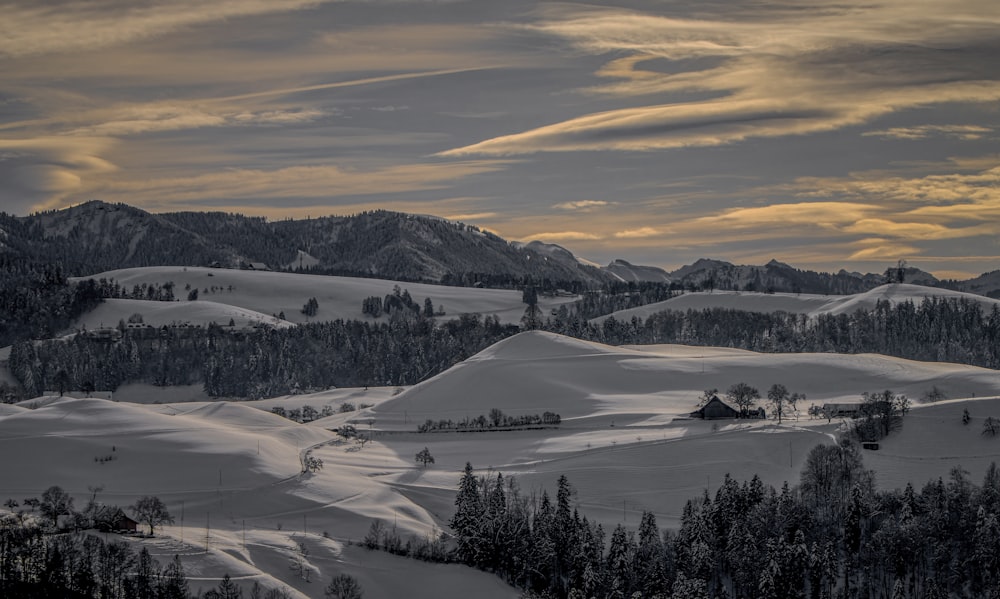 snow covered mountain during daytime