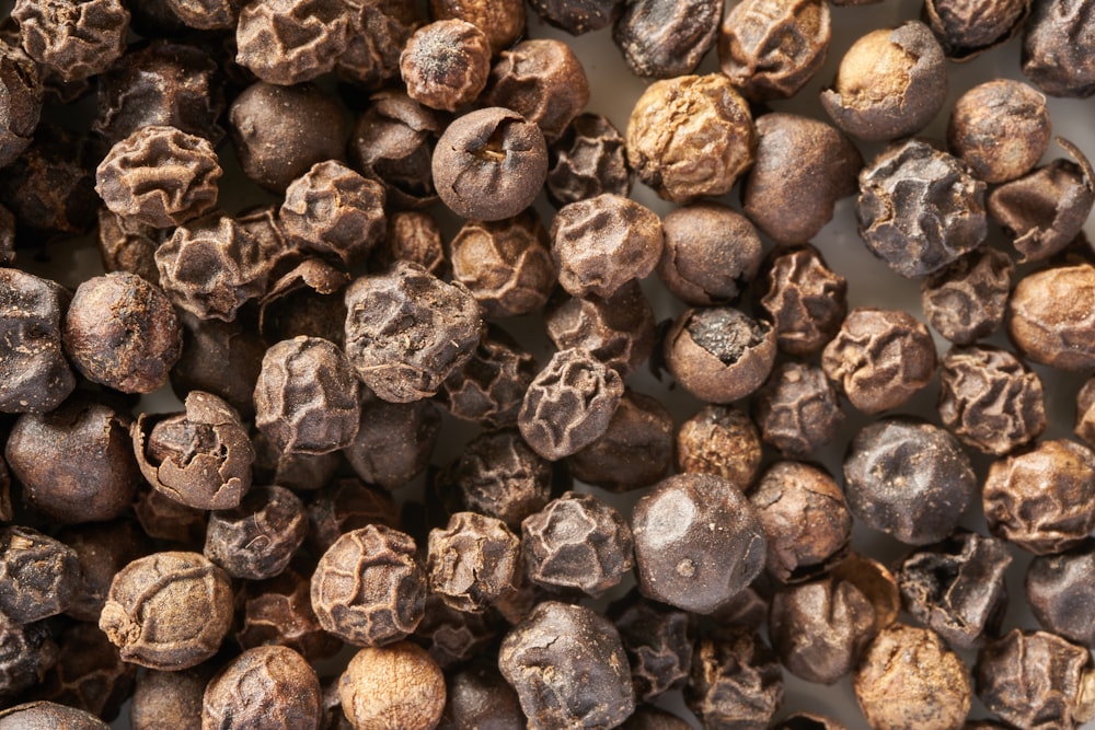 brown and gray stones on black surface