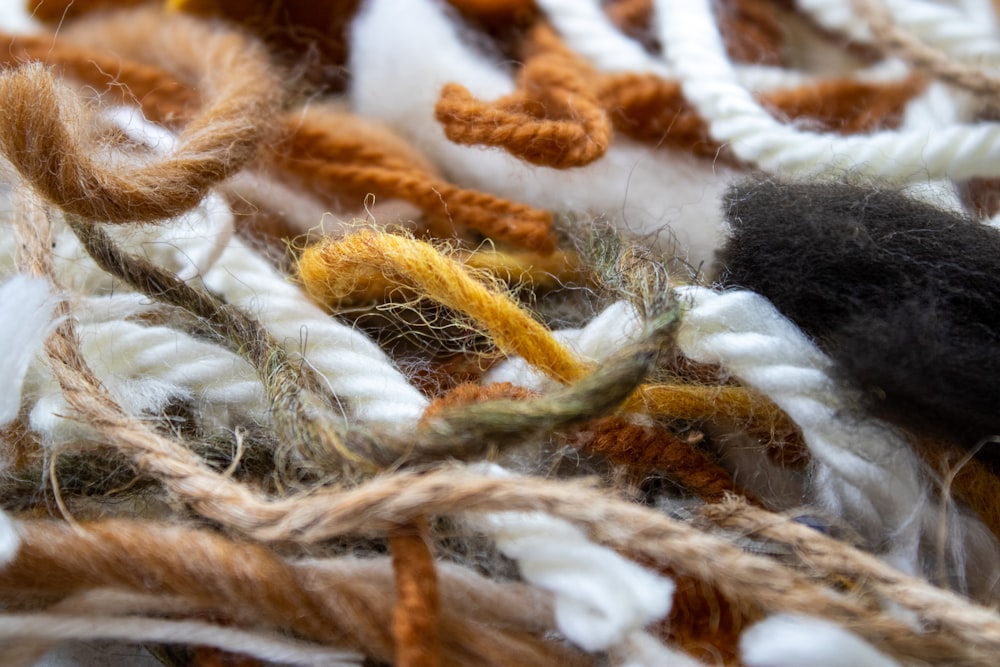 white and brown fur textile