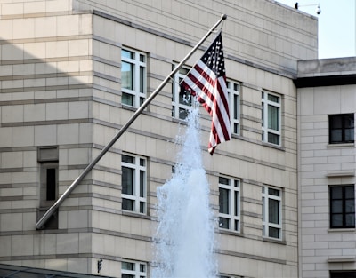brown concrete building with water fountain
