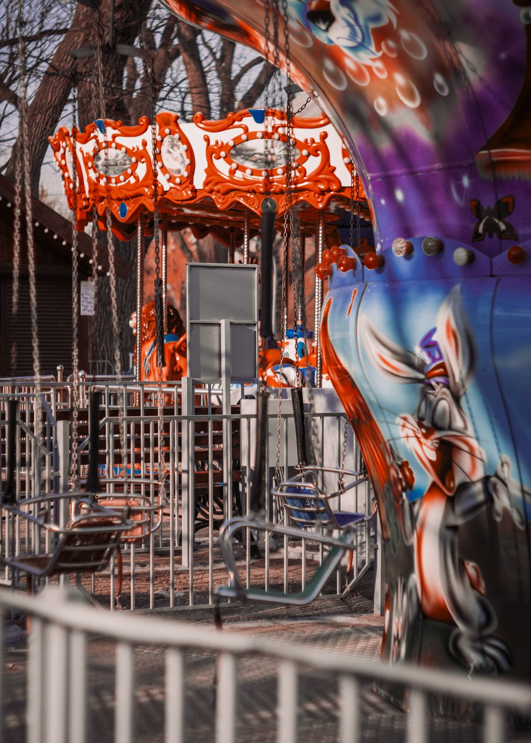 people riding on horse carousel during night time